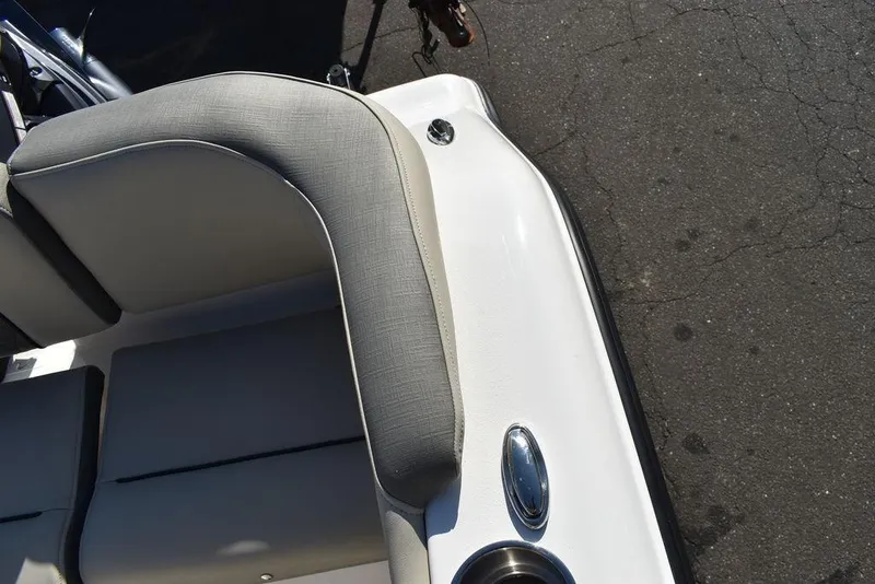 Slide: The Image of 2025 Key West 203 FS boat interior with cushioned seating and sleek design. - 35