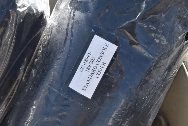 Slide: The Image of Key West 203 FS 2025 standard console cover in packaging. - 37