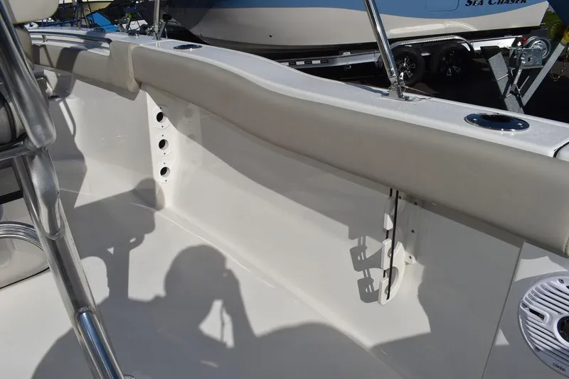 Slide: The Image of 2025 Key West 203 FS boat interior with seating and stainless steel fixtures. - 41