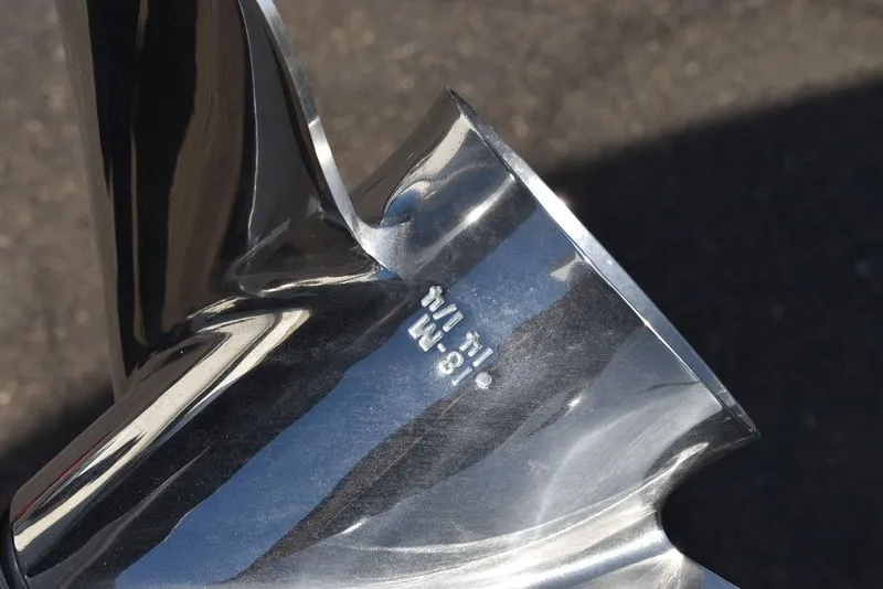 Slide: The Image of Close-up of a shiny metal boat propeller, Key West 203 FS, 2025 model. - 46