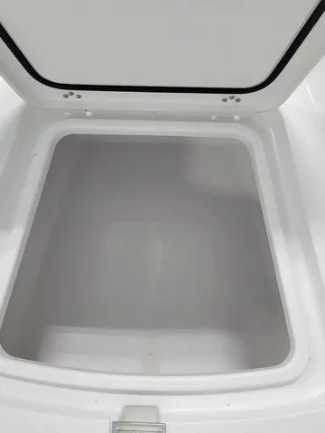 Slide: The Image of Open storage compartment in 2025 Sportsman Heritage 231 boat. - 18