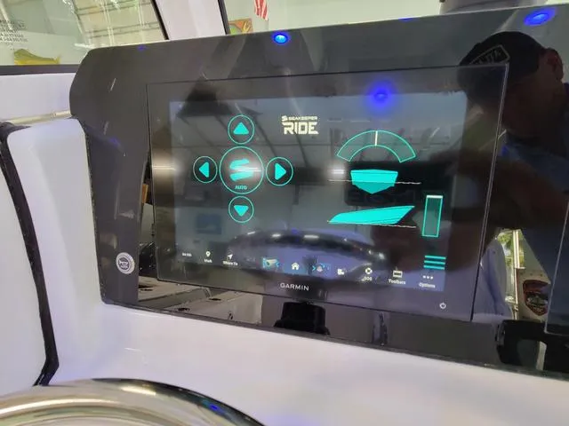 Slide: The Image of Touchscreen display on 2025 Sportsman Heritage 231 boat, featuring navigation and control interface. - 38