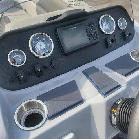 Slide: The Image of 2025 Veranda Vista Sport 20 RC dashboard with gauges and Garmin display. - 13