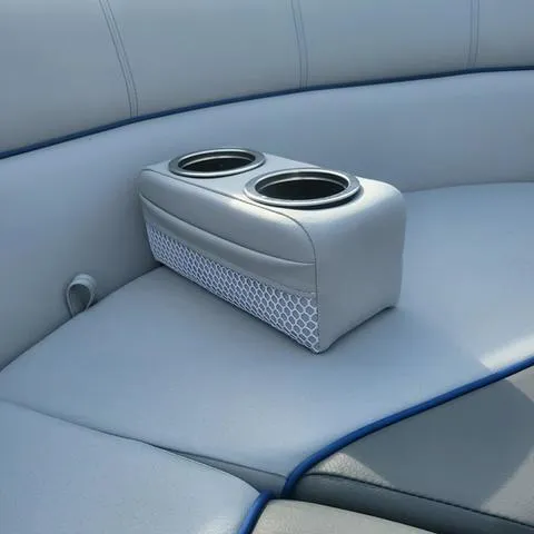 Slide: The Image of 2025 Veranda Vista Sport 20 RC boat interior with cup holders and seating. - 18