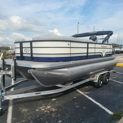 Slide: The Image of 2025 Veranda Vista Sport 20 RC pontoon boat on trailer in parking lot. - 7