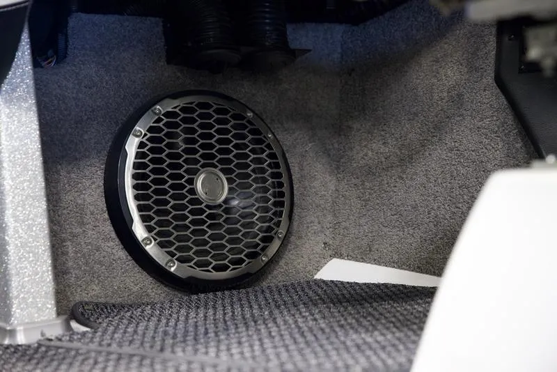 Slide: The Image of Speaker system inside a 2016 Malibu 23 LSV boat, featuring a sleek design. - 11