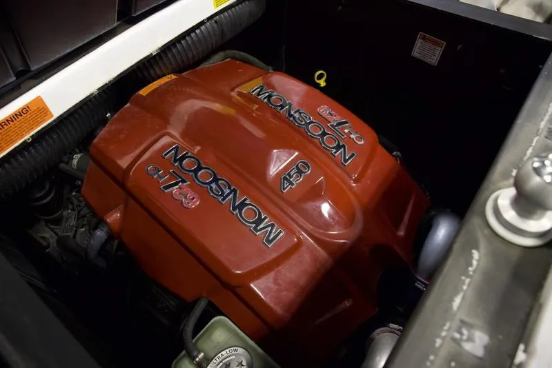 Slide: The Image of 2016 Malibu 23 LSV Monsoon 450 engine, red cover, detailed view. - 16