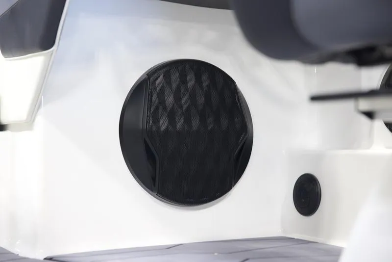 Slide: The Image of 2025 Malibu 22 MXZ boat interior speaker detail. - 22