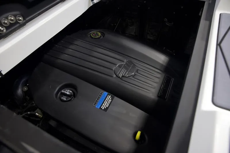 Slide: The Image of 2025 Malibu 22 MXZ engine compartment, showcasing sleek design and advanced engineering. - 27