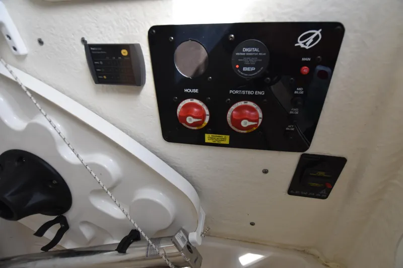 Slide: The Image of Control panel of 2020 Sailfish 290 CC boat with switches and gauges. - 33