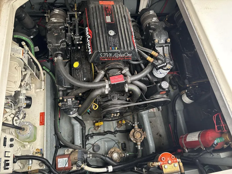 Slide: The Image of Engine compartment of a 1993 Sea Ray 300 boat with MerCruiser 5.7L V8 engine. - 17