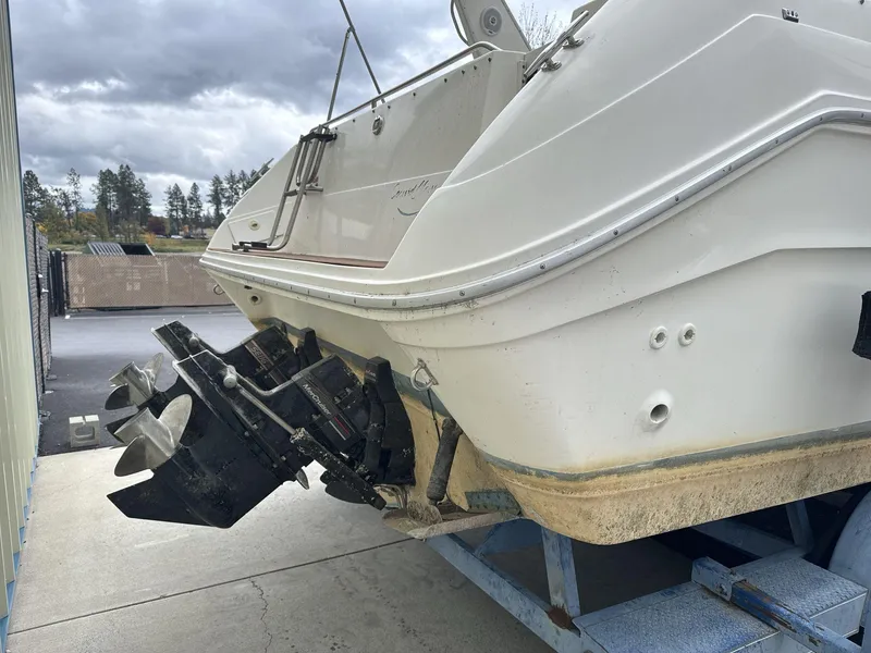 Slide: The Image of 1993 Sea Ray 300 boat on trailer, showing stern and propellers. - 5