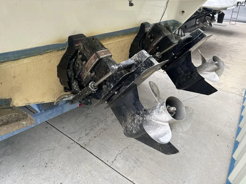 Slide: The Image of 1993 Sea Ray 300 boat with dual MerCruiser outdrives on a trailer. - 7