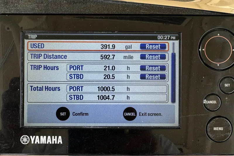 Slide: The Image of Yamaha display showing trip data: 391.9 gallons used, 592.7 miles traveled. - 6