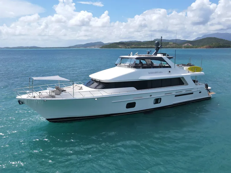 Slide: The Image of Luxury 2013 Cheoy Lee Bravo yacht cruising on clear blue waters. - 2