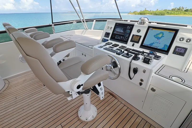 Slide: The Image of Helm of 2013 Cheoy Lee Bravo yacht with modern navigation equipment and ocean view. - 23