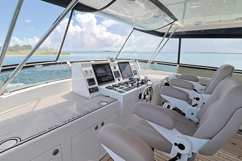 Slide: The Image of 2013 Cheoy Lee Bravo yacht helm with modern controls and ocean view. - 24