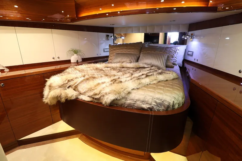 Slide: The Image of Luxurious bedroom interior of 2013 Cheoy Lee Bravo yacht with elegant bedding and wood finishes. - 47
