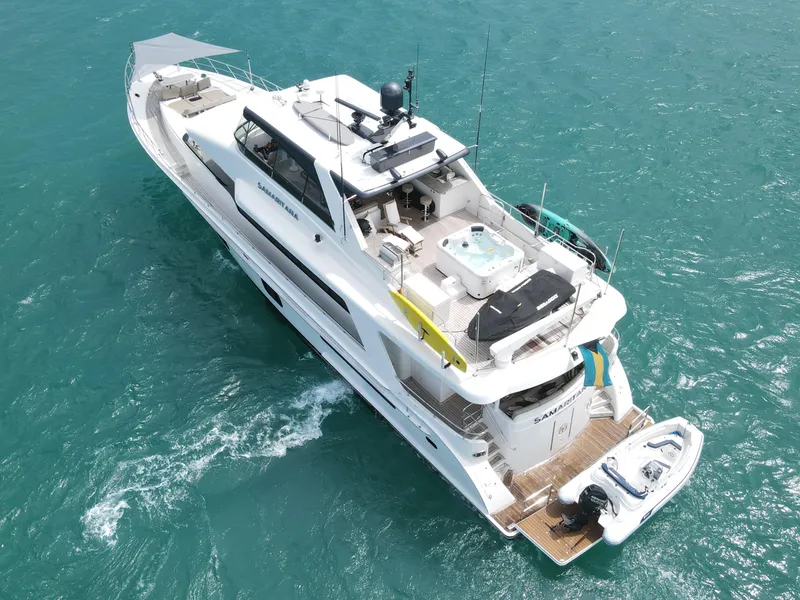 Slide: The Image of Luxury 2013 Cheoy Lee Bravo yacht cruising on turquoise waters. - 5