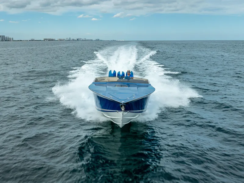 Slide: The Image of 2024 Nor-Tech 360 Monte Carlo Flyer speeding on open water, showcasing sleek design and performance. - 47