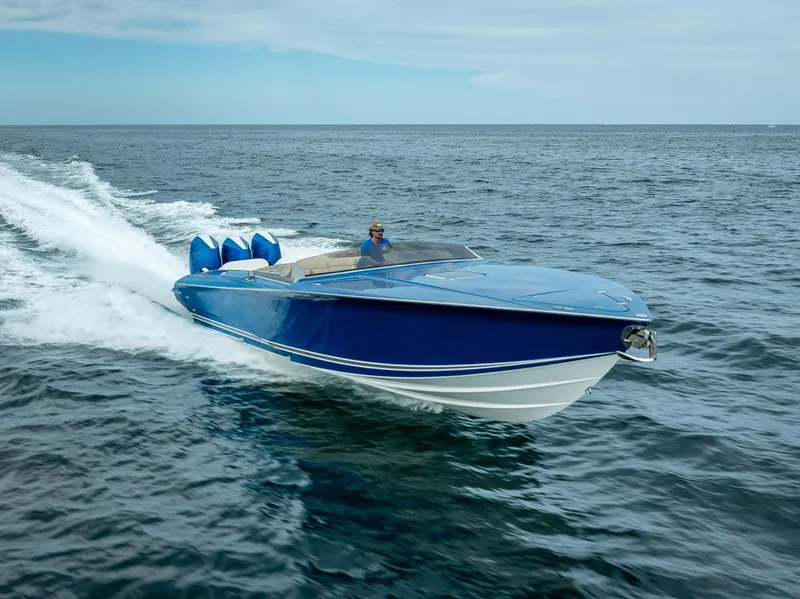 Slide: The Image of 2024 Nor-Tech 360 Monte Carlo Flyer speedboat cruising on open water. - 48
