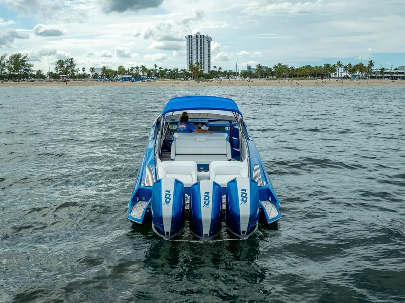 Slide: The Image of 2024 Nor-Tech 360 Monte Carlo Flyer on water, showcasing powerful engines and sleek design. - 21