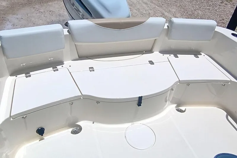 Slide: The Image of 2025 Bulls Bay 230 Center Console boat seating area with cushioned backrests. - 49