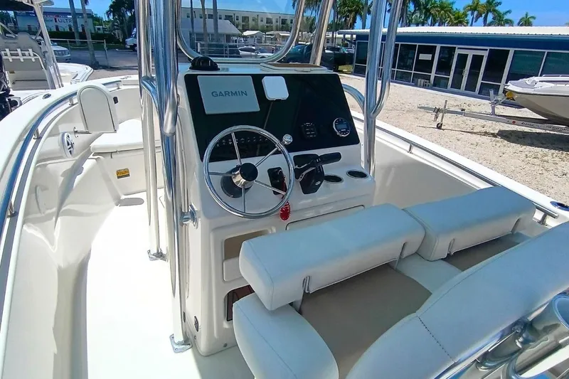 Slide: The Image of 2025 Bulls Bay 230 Center Console boat interior with Garmin navigation system. - 11