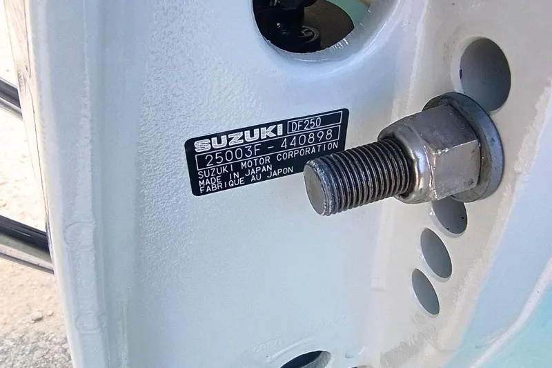 Slide: The Image of Close-up of Suzuki DF250 engine label on 2025 Bulls Bay 230 Center Console boat. - 56