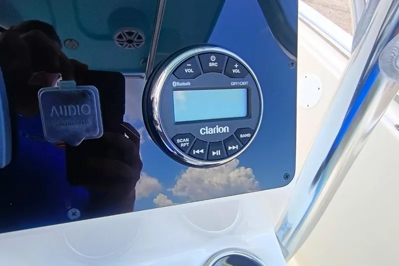 Slide: The Image of Clarion audio system on 2025 Bulls Bay 230 Center Console boat dashboard. - 19