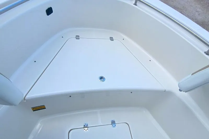 Slide: The Image of 2025 Bulls Bay 230 Center Console boat interior, featuring a spacious storage compartment. - 39