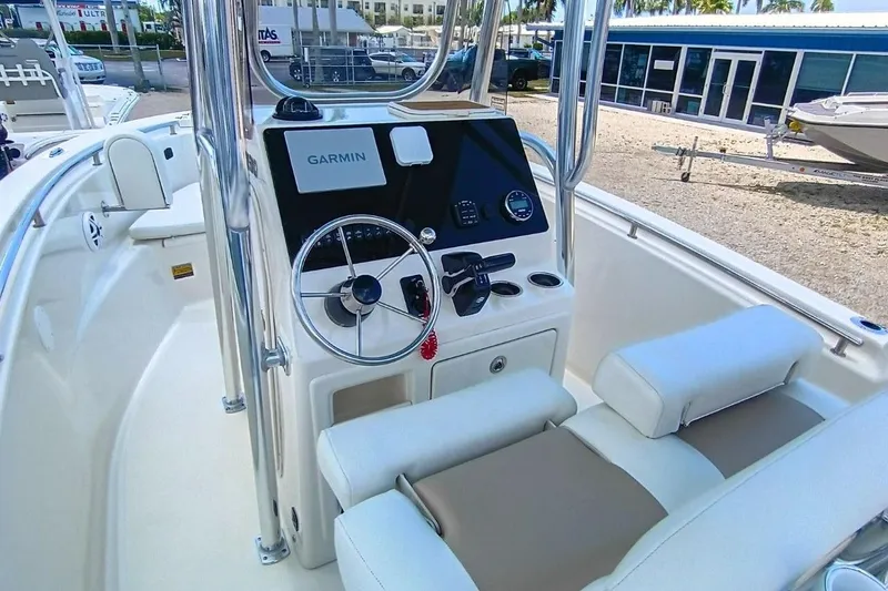 Slide: The Image of 2025 Bulls Bay 230 Center Console boat interior with Garmin navigation system. - 12