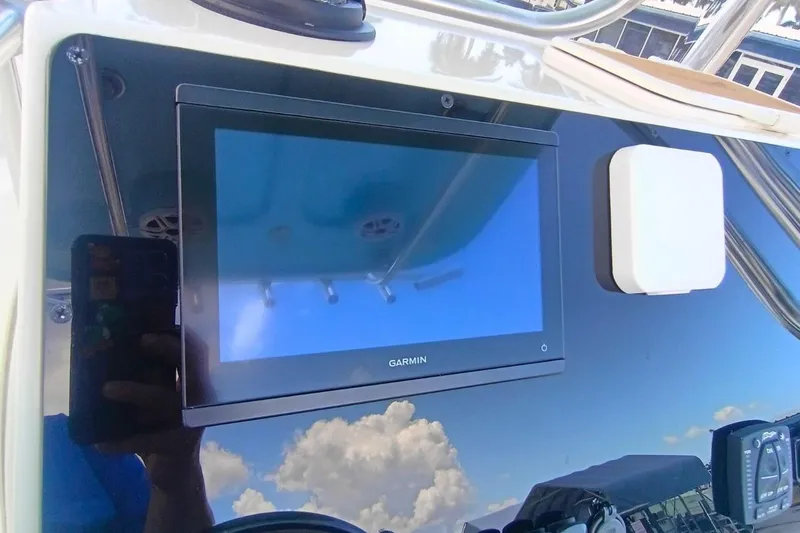 Slide: The Image of Garmin display on 2025 Bulls Bay 230 Center Console boat dashboard. - 16