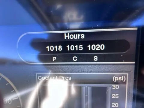 Slide: The Image of Display panel showing engine hours and coolant pressure on 2015 Nor-Tech 340 Sport Center Console. - 12