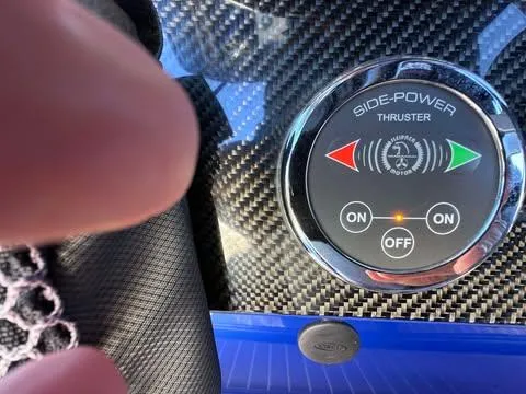 Slide: The Image of Control panel of a 2015 Nor-Tech 340 Sport Center Console with Side-Power thruster. - 14