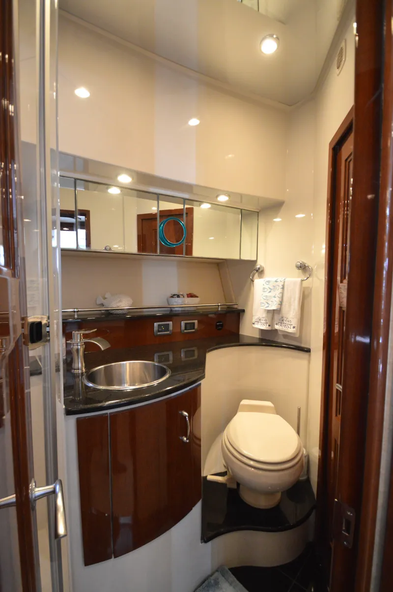Slide: The Image of Luxurious 2007 Marquis 59 yacht bathroom with modern fixtures and elegant design. - 46