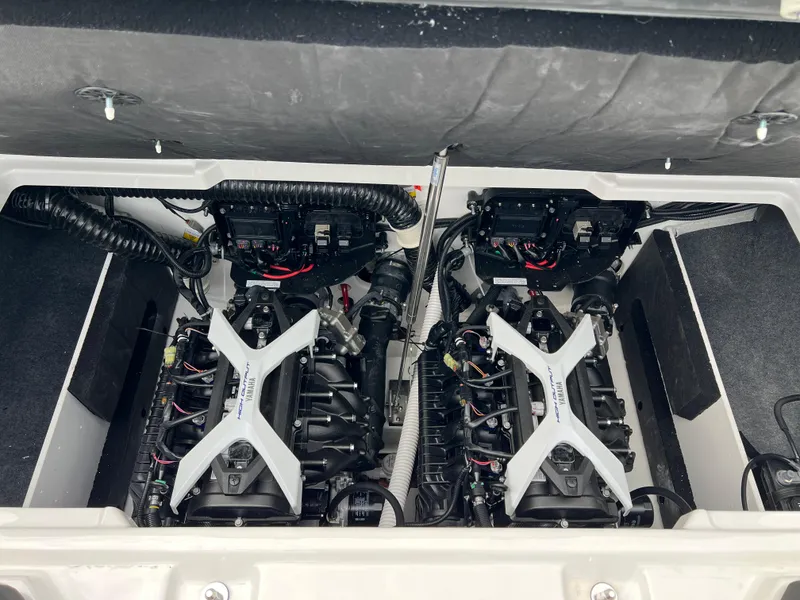 Slide: The Image of Twin engines of a 2025 Yamaha Boats 222SE, showcasing advanced marine engineering. - 22