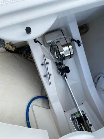 Slide: The Image of 2019 Tiara Sport 39 boat interior with steering mechanism and controls. - 11