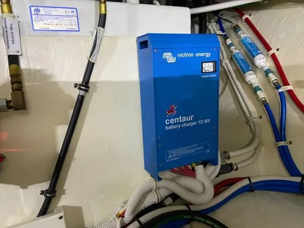 Slide: The Image of Victron Energy Centaur battery charger in 2019 Tiara Sport 39 boat engine room. - 12