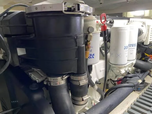 Slide: The Image of Engine components of a 2019 Tiara Sport 39 boat, featuring Volvo filters. - 17