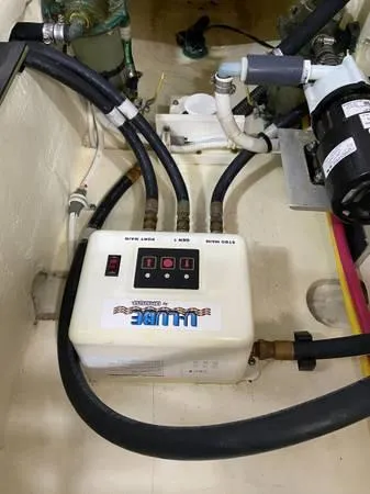 Slide: The Image of Bilge pump system in 2019 Tiara Sport 39 boat engine room. - 18