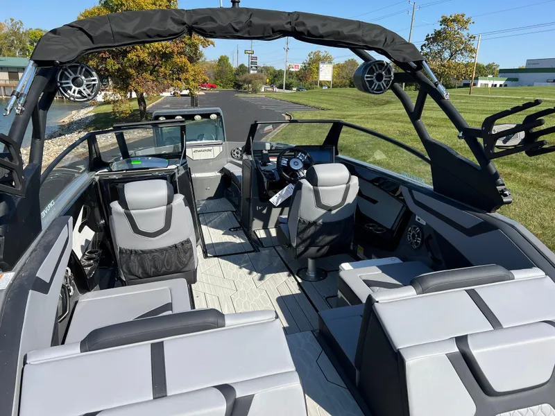 Slide: The Image of 2025 Yamaha Boats 222XD interior, featuring sleek seating and modern design elements. - 11