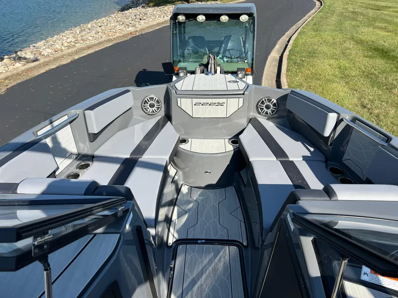 Slide: The Image of 2025 Yamaha Boats 222XD interior with sleek seating and modern design. - 16