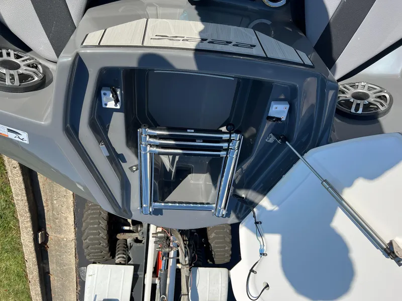 Slide: The Image of 2025 Yamaha Boats 222XD swim platform with ladder and speakers. - 18