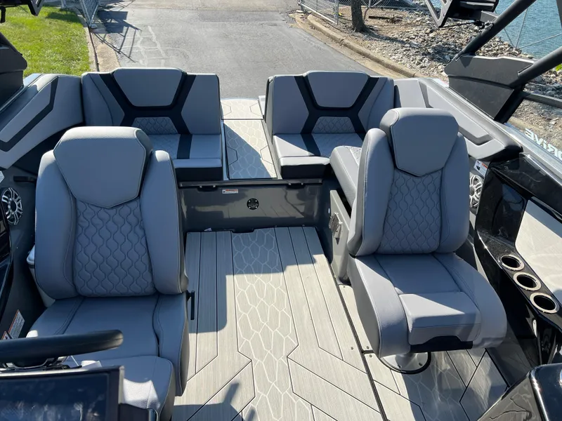 Slide: The Image of 2025 Yamaha Boats 222XD interior with gray seating and modern design. - 21