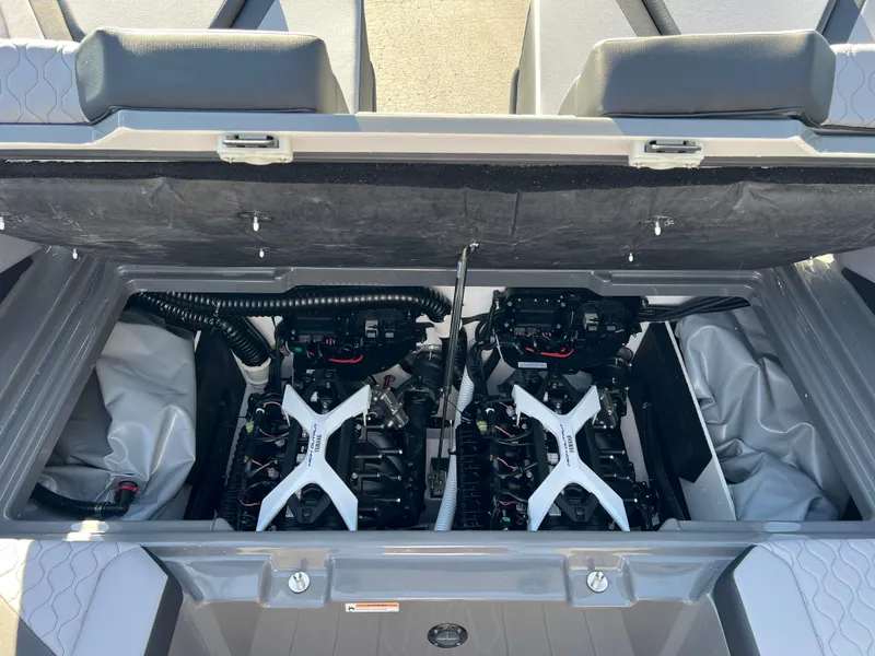 Slide: The Image of 2025 Yamaha Boats 222XD engine compartment, showcasing dual engines and sleek design. - 24