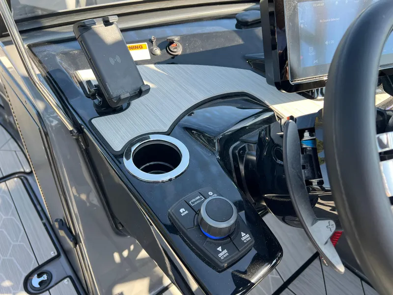 Slide: The Image of Control panel of 2025 Yamaha Boats 222XD with modern navigation features. - 25