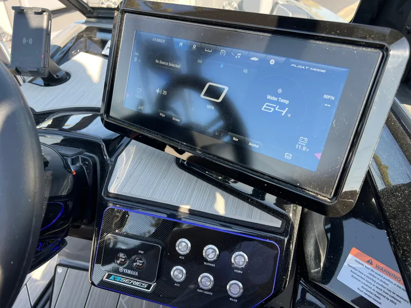 Slide: The Image of Yamaha Boats 222XD 2025 dashboard with touchscreen display and control panel. - 27