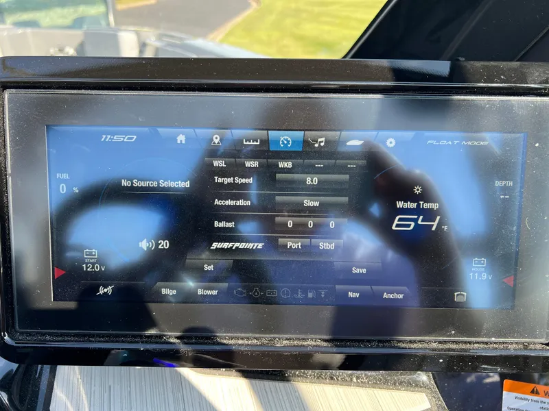 Slide: The Image of Yamaha Boats 2025 222XD dashboard display showing speed, water temperature, and settings. - 29