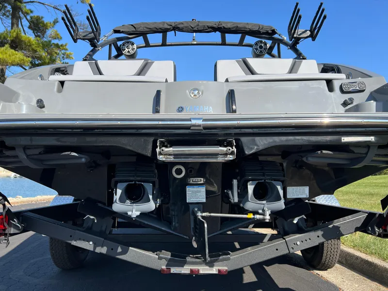 Slide: The Image of 2025 Yamaha Boats 222XD rear view, showcasing dual engines and sleek design. - 7